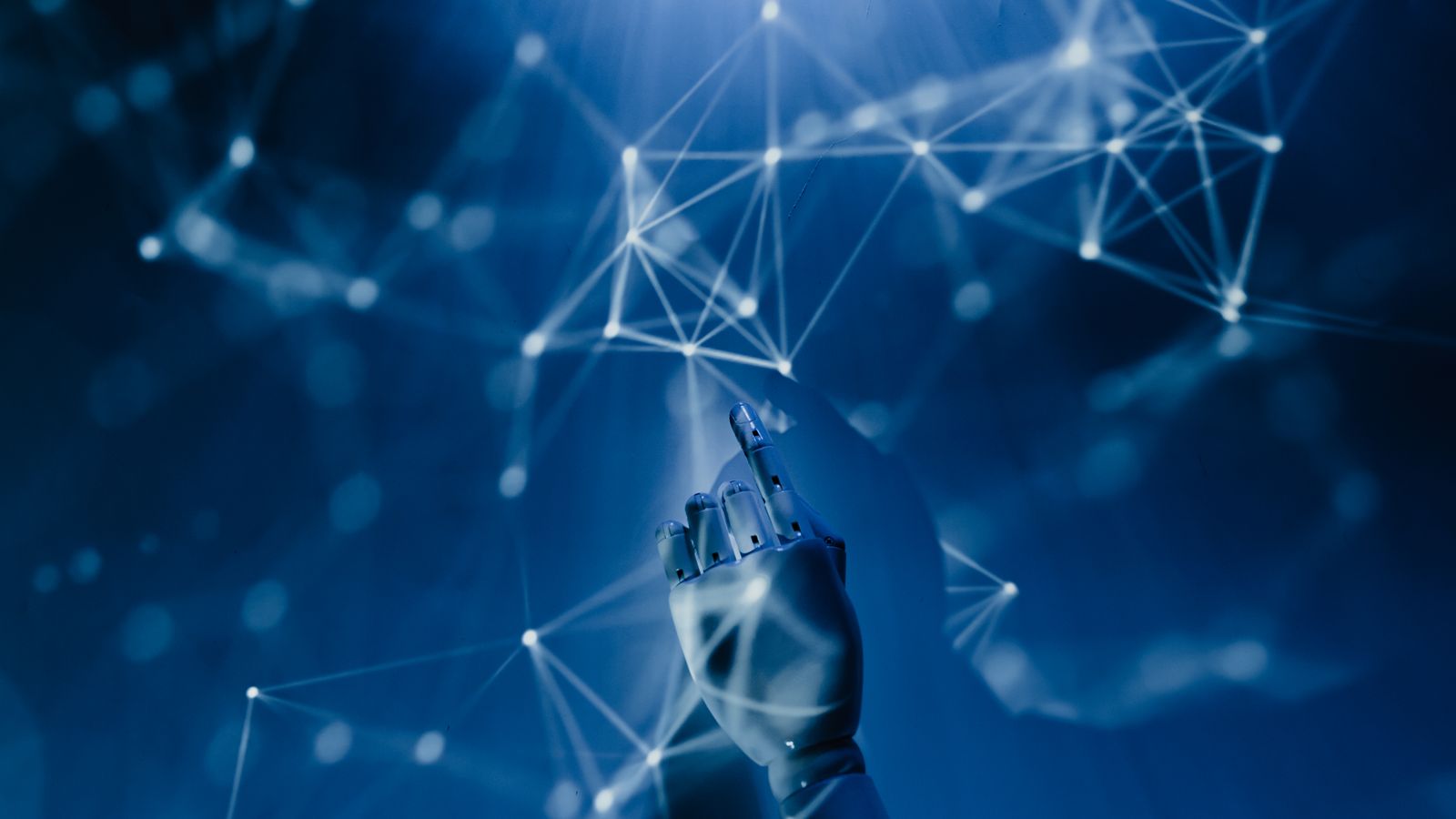 A robotic hand touching a glowing blue digital network, representing an agentic AI voice agent
